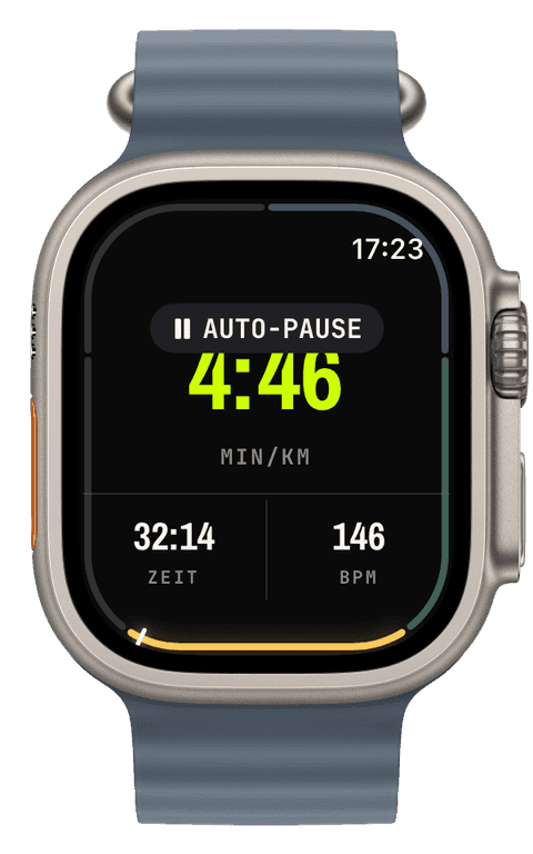 Die Watch mitten im Lauf mit der AUTO-PAUSE-Kapsel über dem Screen mit Tempo, Zeit und Herzfrequenz